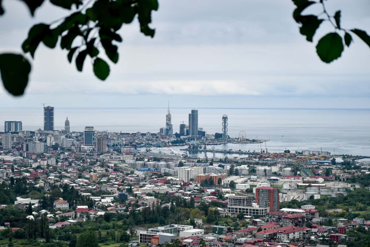 Batumi seen from the hills, the city sweeping down to the Black Sea and its skyline.